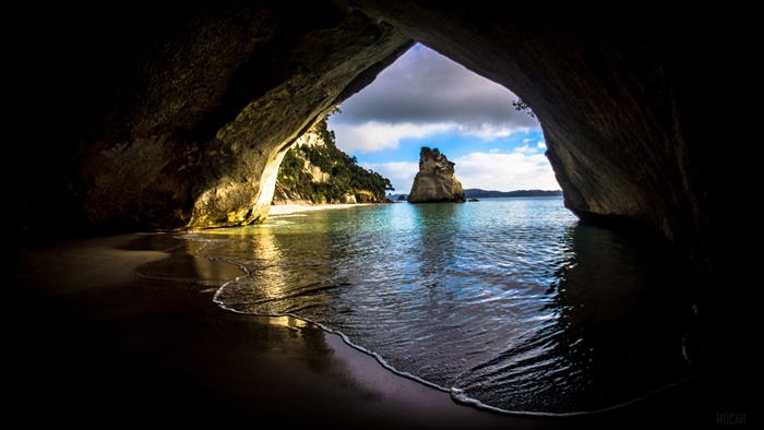 Cave Entrance to Ocean with Rock Formation 4K