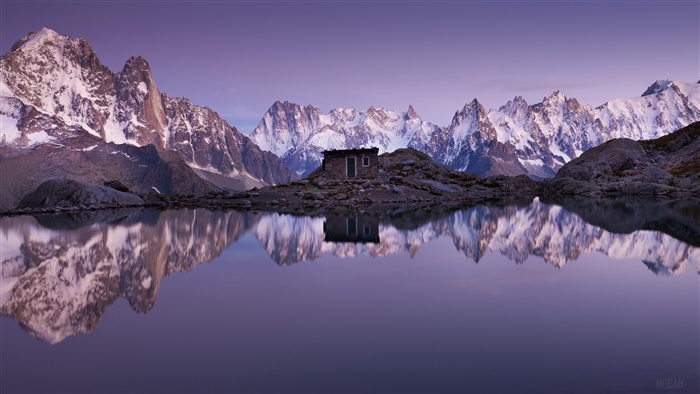 Snowy Mountains Reflected in Lake with Cabin 4K