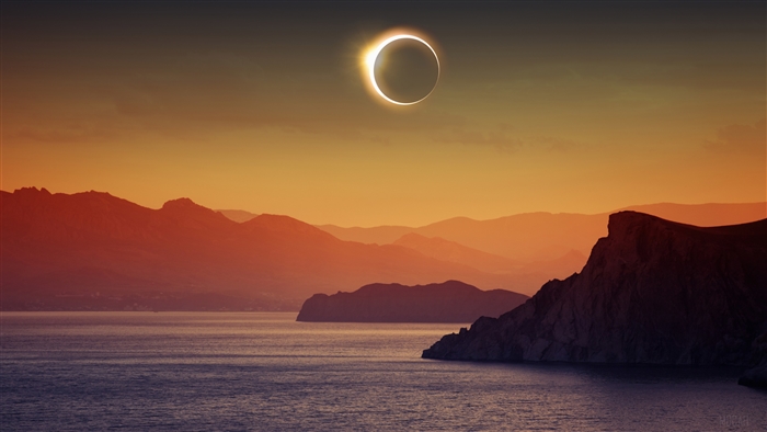 Solar Eclipse over Mountains and Sea 4K