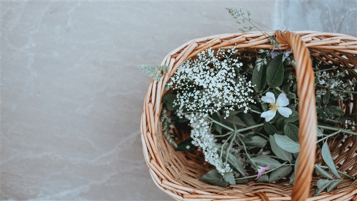 Basket of wildflowers and grass 4K