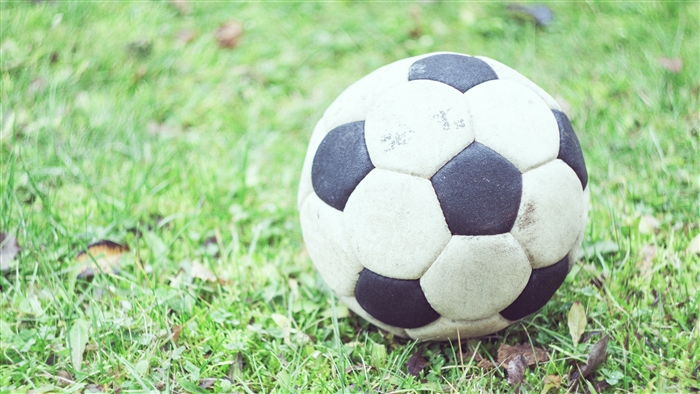 Soccer ball on grass, 4K