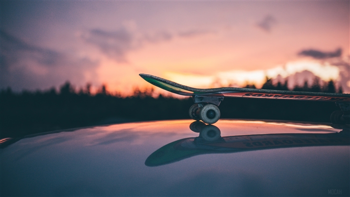 Skateboard at Sunset 4K
