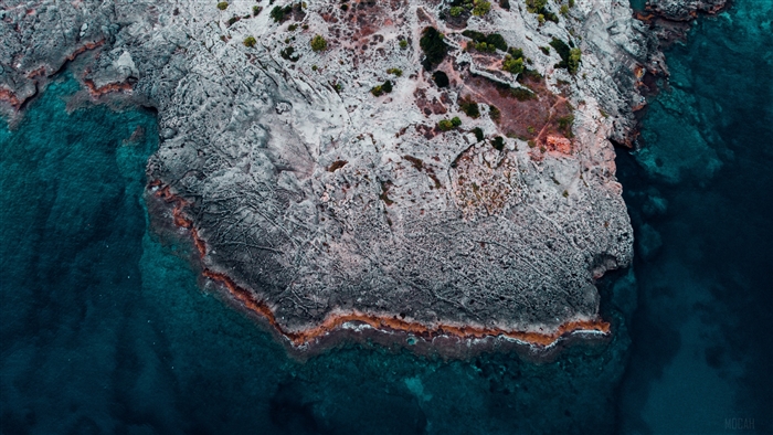 Aerial view of rocky shore and ocean