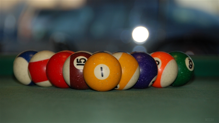 Billiard balls on a green cloth, 4K