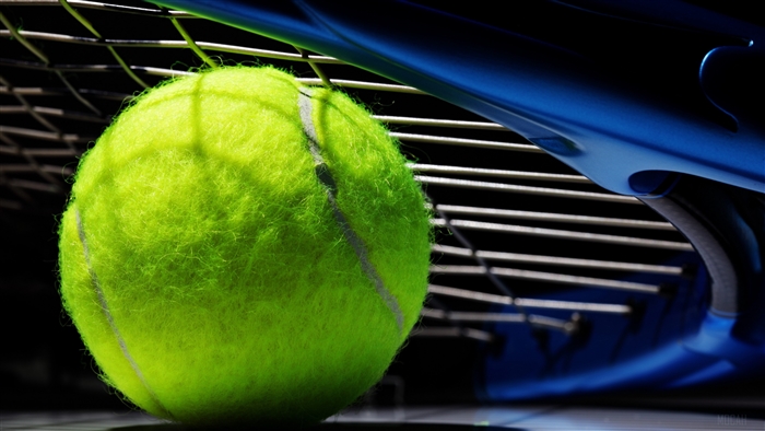Tennis ball and racket strings