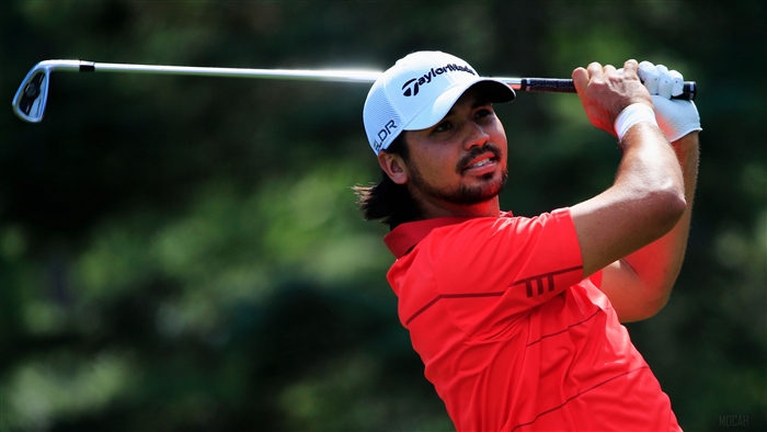 Jason Day playing golf