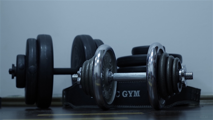 Dumbbells and Weight Disks in Gym 4K
