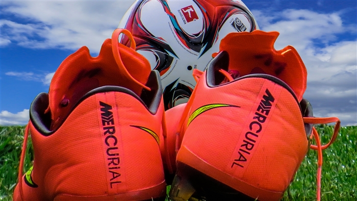 Soccer cleats and ball 4K