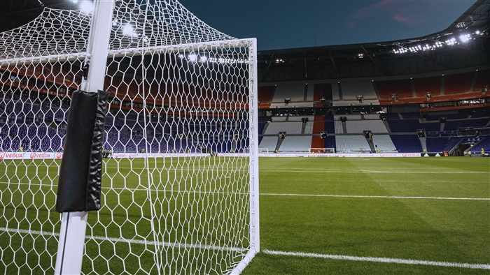 Football goal and stadium tribunes 4K