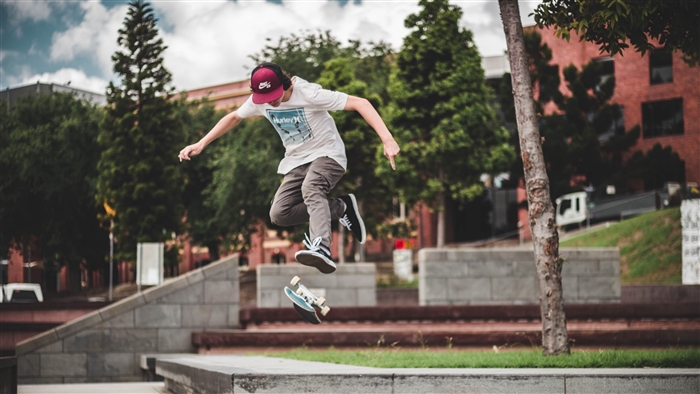Skateboarder performing a trick in a street setting 4K