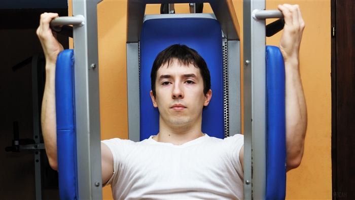 Man on a butterfly machine