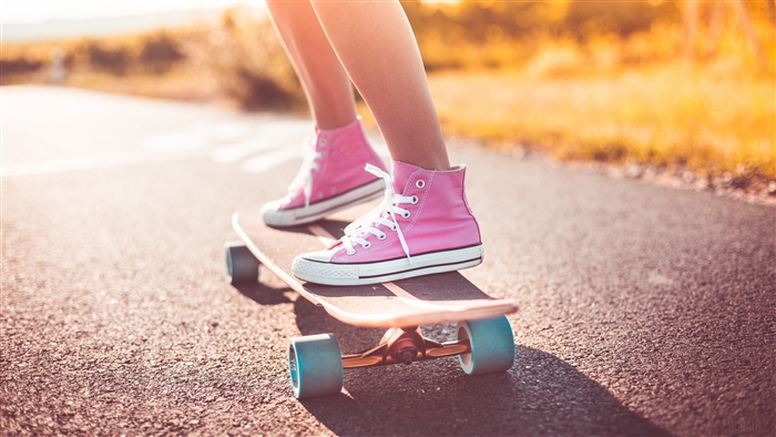 Skateboarder in Pink Sneakers on Sunny Road