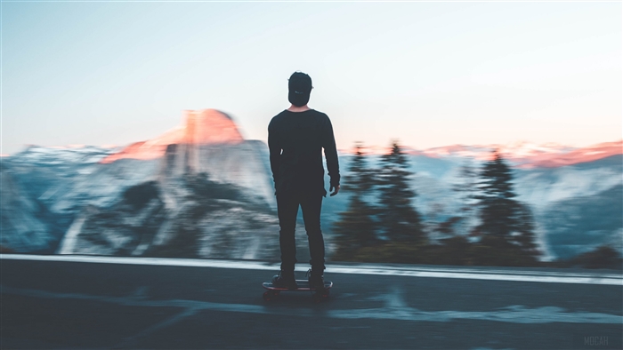 Skateboarder in Yosemite National Park at Sunset 4K