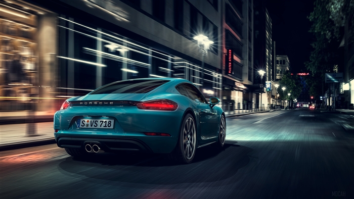 Porsche Cayman S driving at night