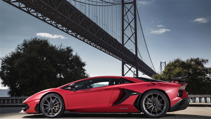 Red Lamborghini Aventador SVJ 4K under a bridge