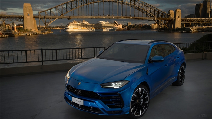 Blue Lamborghini Urus in Sydney with Harbour Bridge