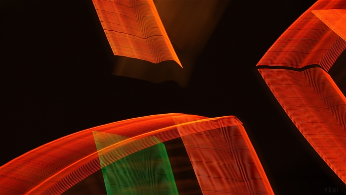 Abstract red and green light streaks on black background 4K