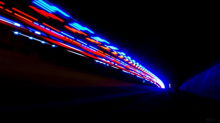 Light trails in a dark tunnel 4K