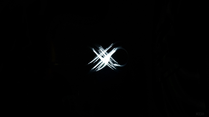 Light painting of X and infinity symbol