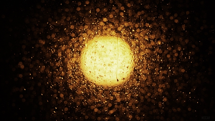 Light through rain drops on glass 4K