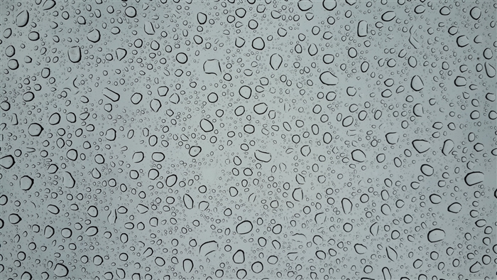 Close-Up of Water Droplets on Glass Surface