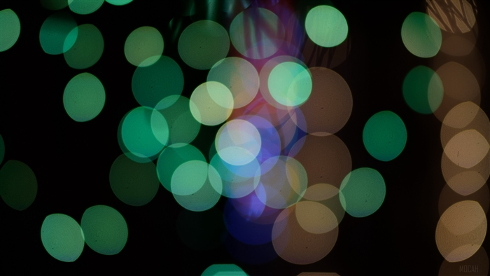 Abstract green and gold bokeh circles 4K