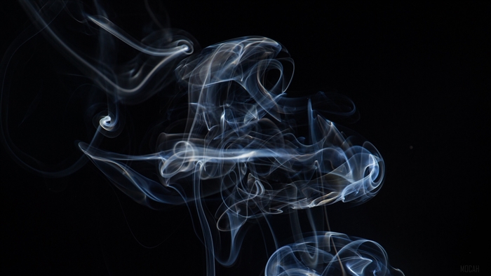 Smoke wisps on dark background 4K