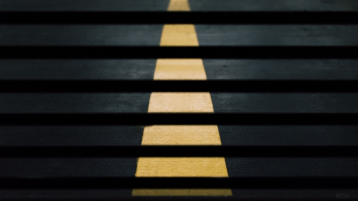 Yellow Line on Black Textured Surface