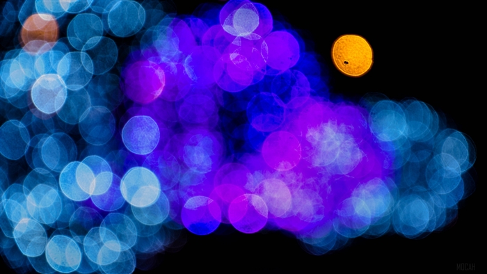 Blue and purple bokeh lights with orange circle