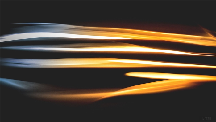 Motion blur streaks of orange and white light