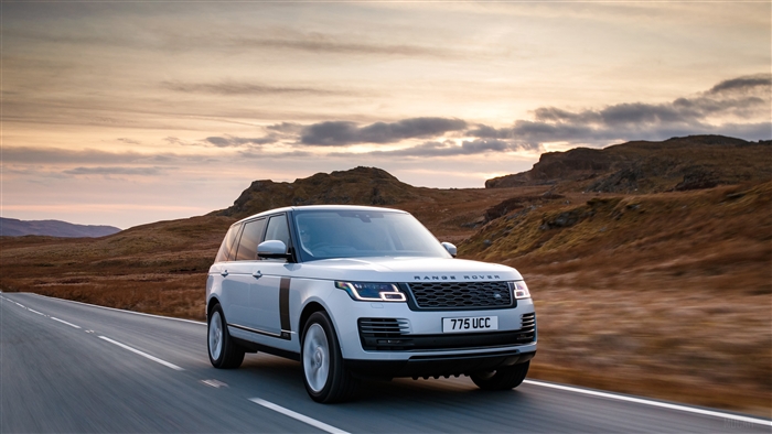 White Range Rover Autobiography P400e LWB 2018 driving on road