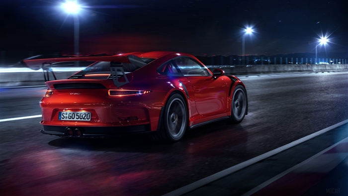 Red Porsche GT3 RS driving on road at night