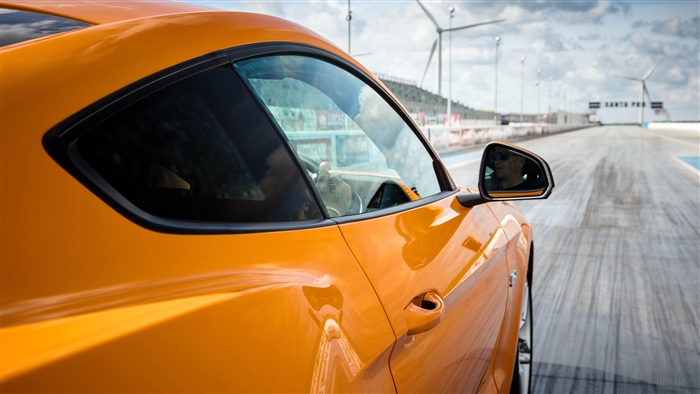 4K Ford Mustang GT Fastback on a Racetrack