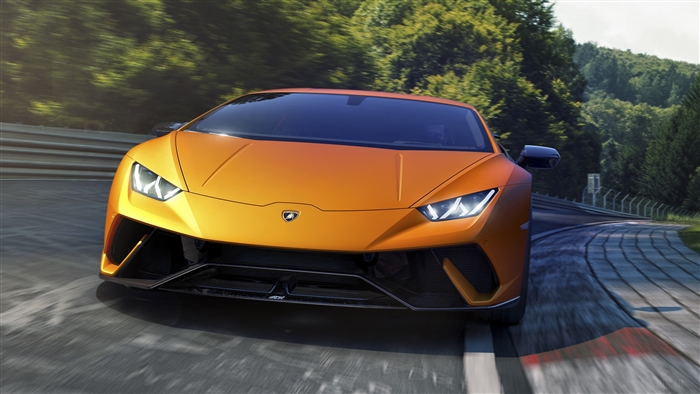 Orange Lamborghini Huracan Performante on a Racetrack 4K