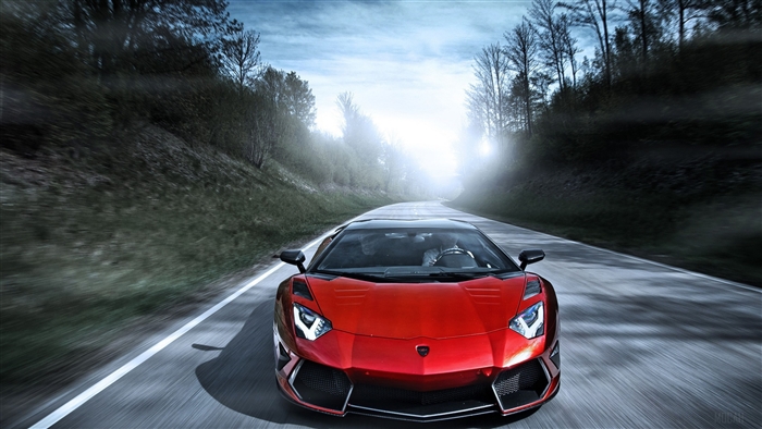Red Lamborghini Aventador driving on a road