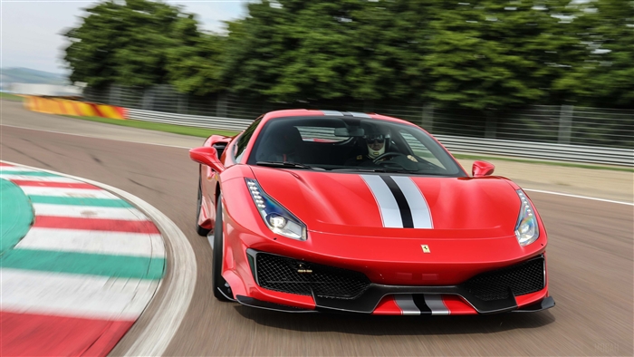 Red Ferrari 488 Pista on a Race Track