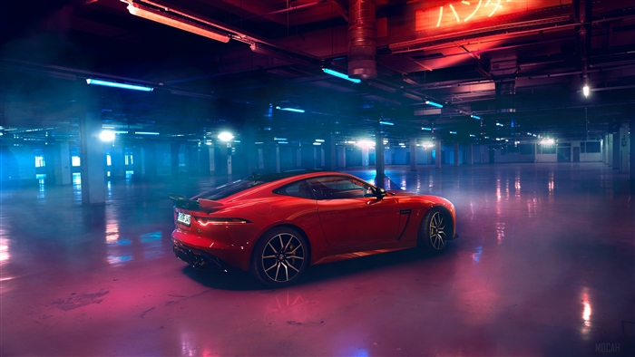 Red Jaguar F-Type 2018 in a dimly lit garage