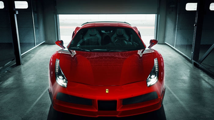 Red Ferrari 488 GTB parked in garage