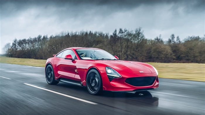 Red TVR Griffith 4K driving on a wet road