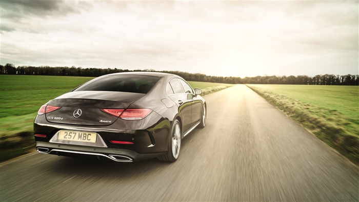 Mercedes-Benz CLS 400 D 4Matic driving on a road