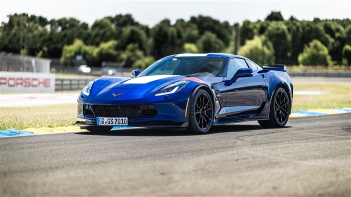 Blue Chevrolet Corvette Grand Sport on a Race Track