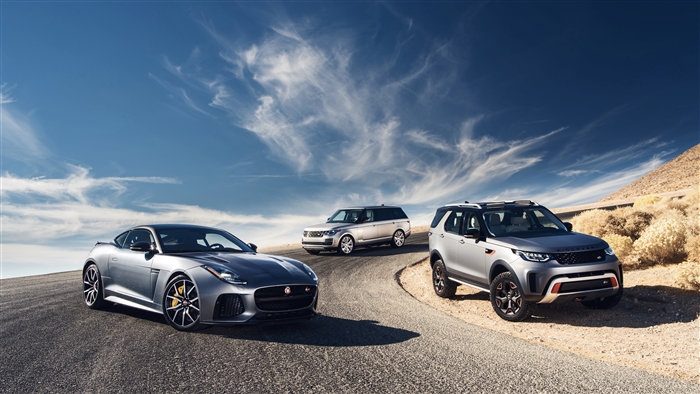 Jaguar and Land Rover SUVs on a Desert Road