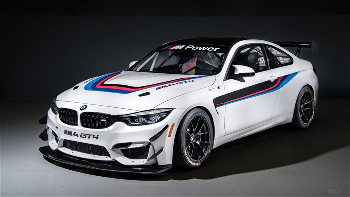White BMW M4 GT4 race car with M Power livery