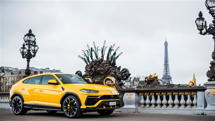 Yellow Lamborghini Urus on Pont Alexandre III, Paris