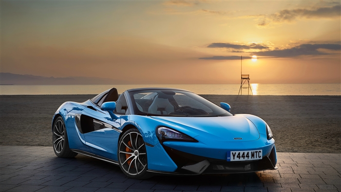 Blue 2018 McLaren 570S Spider Convertible on Beach at Sunset