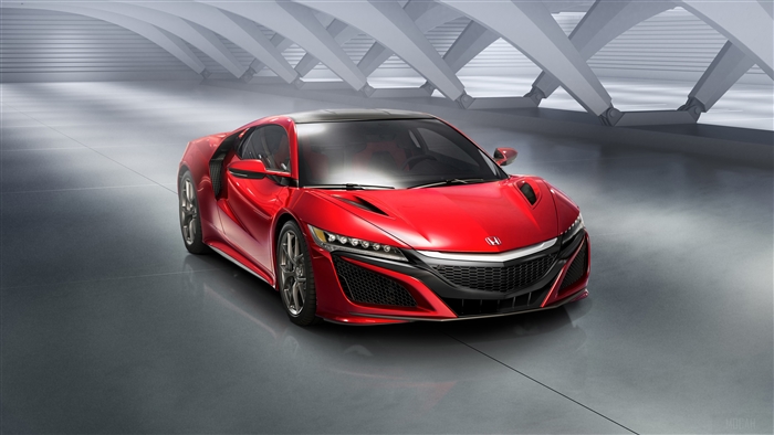 Red Honda NSX sports car in a modern showroom