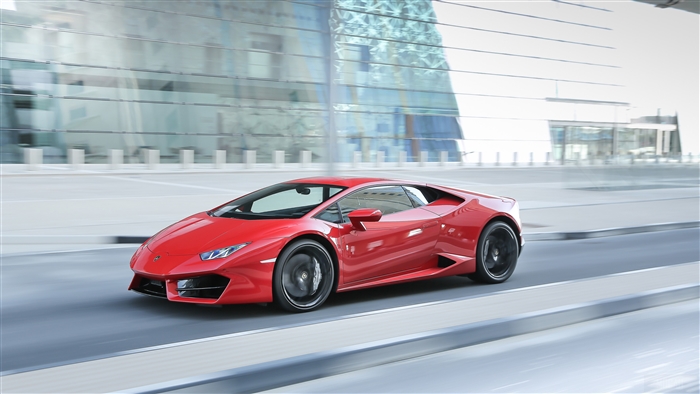 Red Lamborghini Huracan driving on road 4K