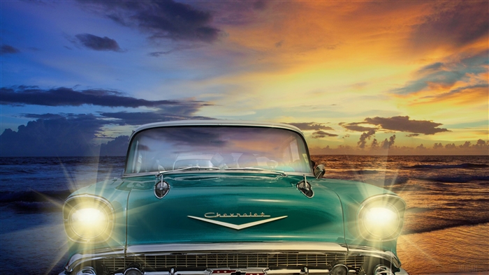Chevrolet Classic Vintage Car on Beach at Sunset