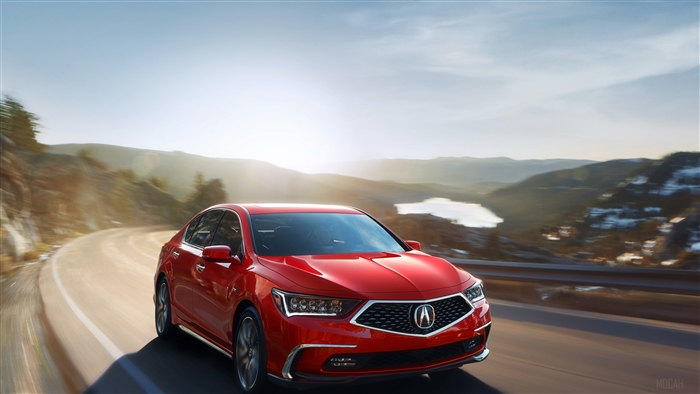 Red 2018 Acura RLX Sport Hybrid SH AWD driving on mountain road