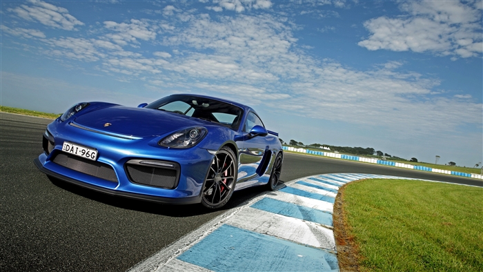 Blue Porsche Cayman GT4 on a Racetrack 4K